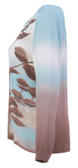 Dolcezza long-sleeve blouse with a vertical ombré colour block design in light blue, white, and dusty rose, featuring a brown leaf branch graphic printed on the front.