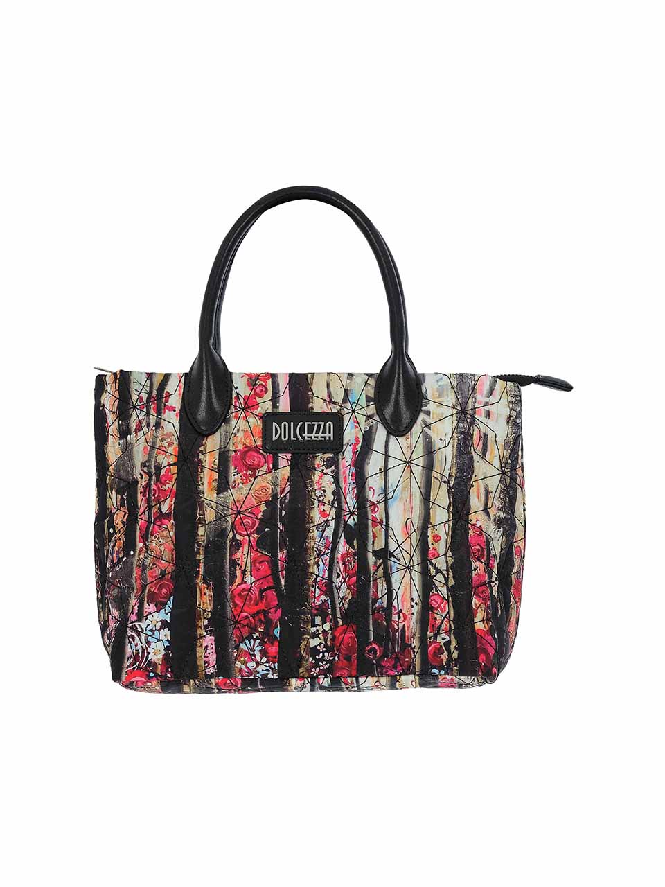 Dolcezza tote bag featuring a black and multicolor vertical floral and tree print, with black leather handles and a black brand label on the front.