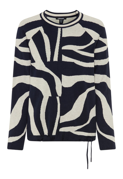 A long-sleeve crewneck sweater featuring a bold zebra-like abstract knit pattern in navy blue and cream, with a drawstring detail at the hem.