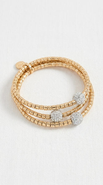 Envy gold beaded wrap bracelet featuring three round pavé-set clear stones, displayed on a clean white textured background.