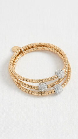 Envy gold beaded wrap bracelet featuring three round pavé-set clear stones, displayed on a clean white textured background.