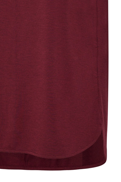 Close-up of burgundy fabric texture on a white background