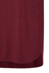 Close-up of burgundy fabric texture on a white background