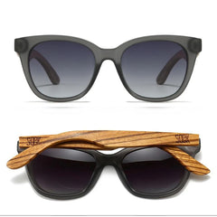Soek Women's Lincolnshire Boutique Sunglasses with blue frames and dark lenses