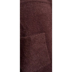 A close up of a dark brown, fuzzy textured fabric with a small stitched pocket detail.