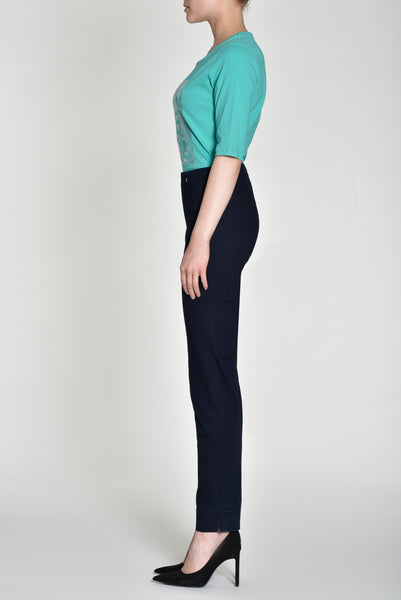 Side profile of model wearing Robell Marie Navy Jeans with side ankle splits.