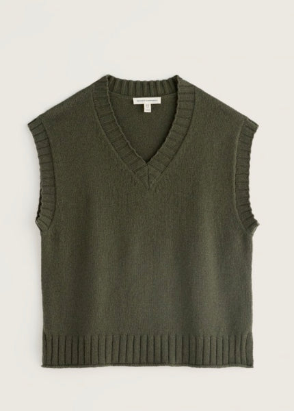 An olive green ribbed knit sweater vest with a V-neck, sleeveless design, and ribbed trim, displayed flat against a light off-white background.
