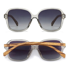 Soek Women's Lincolnshire Sunglasses with wooden arms on a white background