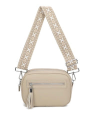 Women’s Beige crossbody bag with a patterned strap on a white background.
