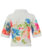 White jacket with colourful design on the back against a white background.