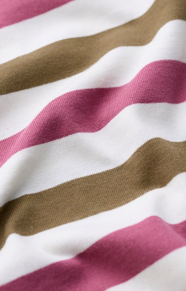 A close-up of a striped fabric with wavy horizontal bands of dusty pink, olive brown, and white.