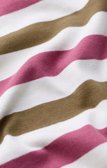 A close-up of a striped fabric with wavy horizontal bands of dusty pink, olive brown, and white.