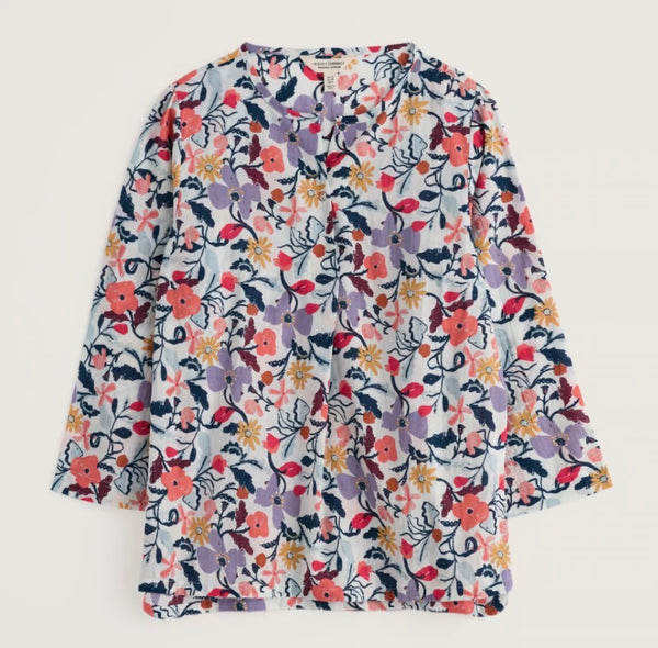 Floral patterned shirt on a white background.