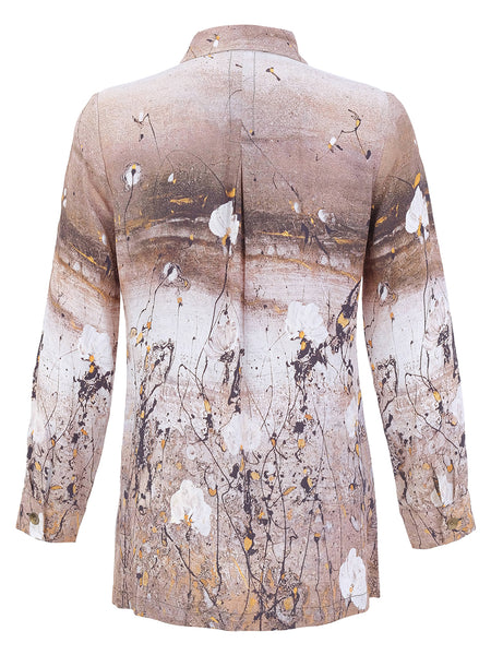 A women's long-sleeve button-down Dolcezza shirt shown from the back, featuring an abstract painterly print in shades of beige, brown, white, and black with subtle gold accents.