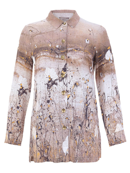 A long-sleeve Women's Dolcezza button-up shirt with a beige, brown, and white abstract paint-splatter print, featuring small gold-tone buttons down the front.