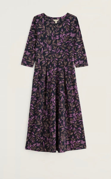 Seasalt three-quarter sleeve midi dress with a purple and brown botanical leaf pattern on a black background, displayed flat against a light beige backdrop.