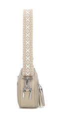 Beige handbag with a patterned strap on a white background