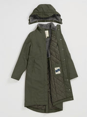 Seasalt olive green hooded coat with grey quilted lining, shown open against a light grey background. The hood is displayed above the coat, and a small brand patch is visible on the lining.