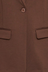 Close-up of Ichi brown blazer showing the chest area with a single button closure and two flap pockets.