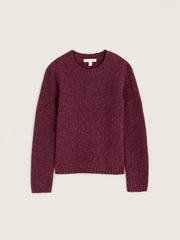 A maroon Seasalt crewneck knit sweater with a textured, heathered finish, displayed flat against a light beige background.