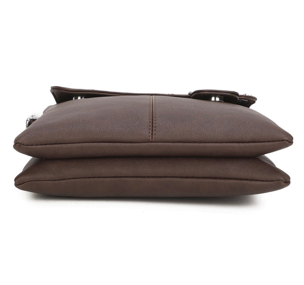 Profile of brown handbag on its back on a white background 