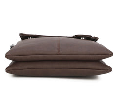 Profile of brown handbag on its back on a white background 