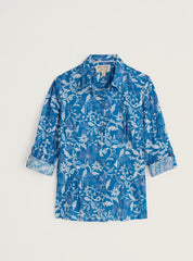 Blue floral patterned shirt on a light grey background.