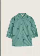 A green  Seasalt button-up shirt with a collar and an all-over embroidered floral pattern, displayed flat against a light cream background.