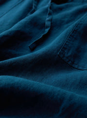 Close-up of blue fabric with visible texture.