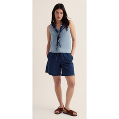 Women’s knitted sleeveless vest top in blue fog.