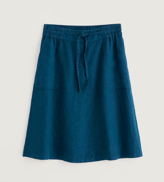 Blue skirt with a tie waist on a light grey background.