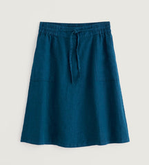 Blue skirt with a tie waist on a light grey background.