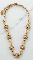 Envy Jewellery chunky gold chain necklace with diamanté detail on a white marble background.