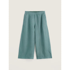 Teal wide-leg pants on a light beige background. 